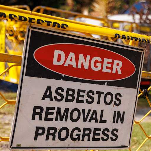 Danger asbestos removal in progress sign.